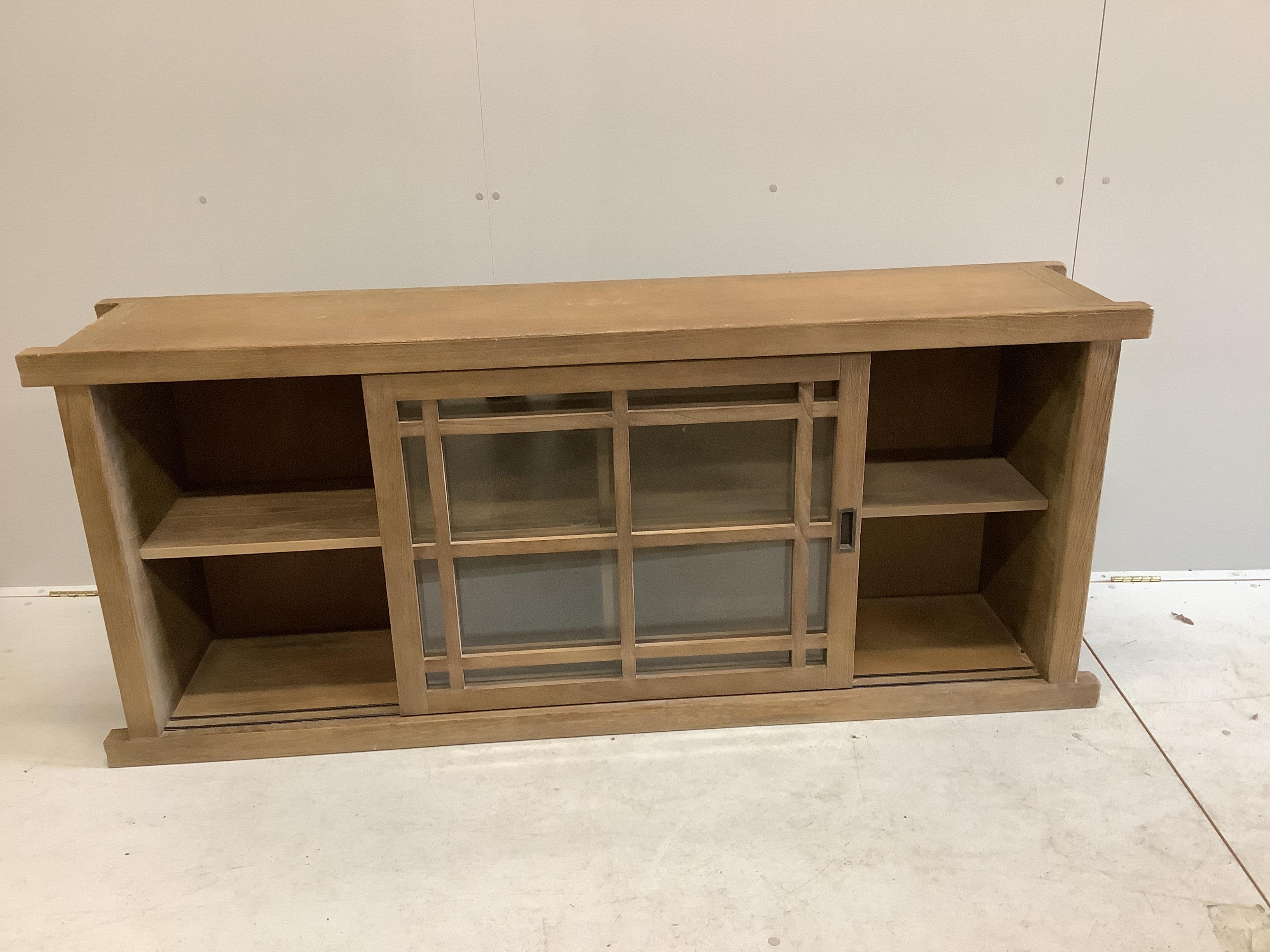 A Danish Aarhus Spenser two door low bookcase, width 180cm, depth 38cm, height 77cm